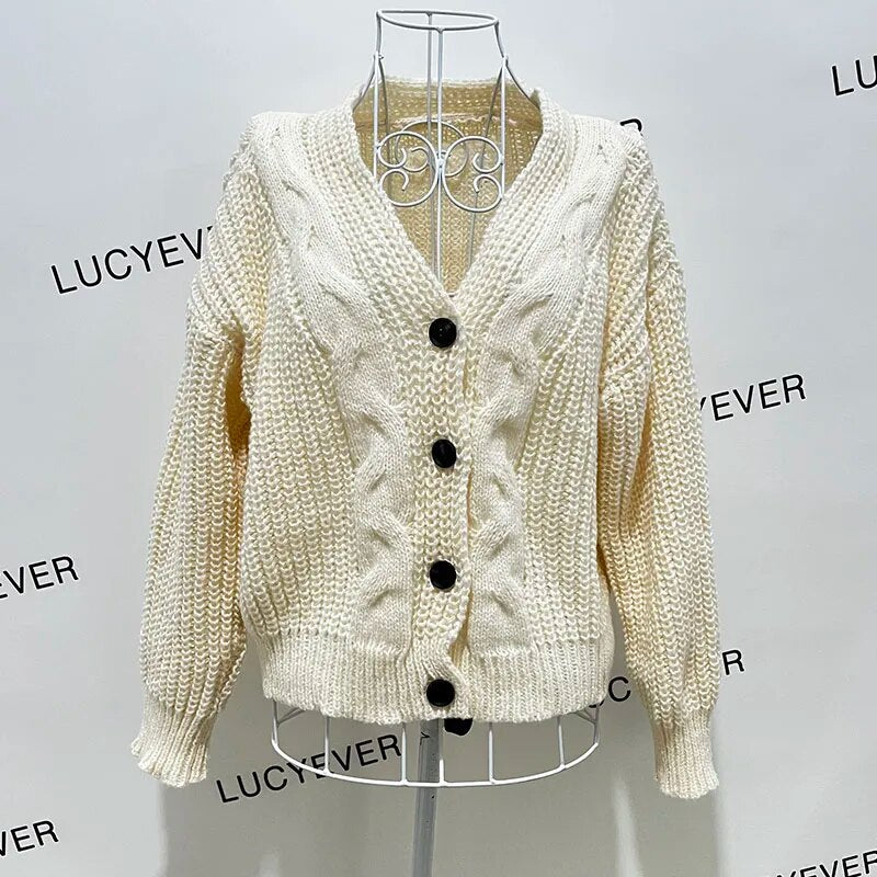 Cardigan with button placket in chunky, twisted knit